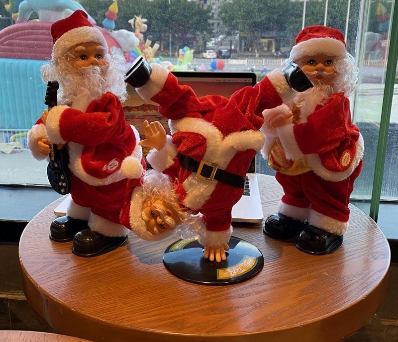 One-handed handstand street dance Santa Claus