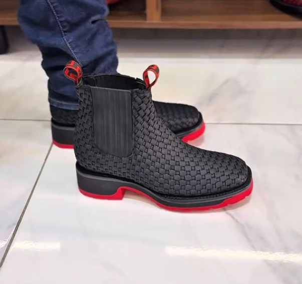 Red-soled ankle boots