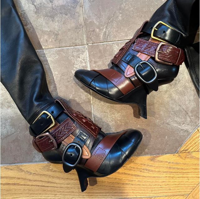 Women's brown leather buckle boots