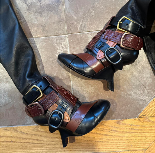 Women's brown leather buckle boots