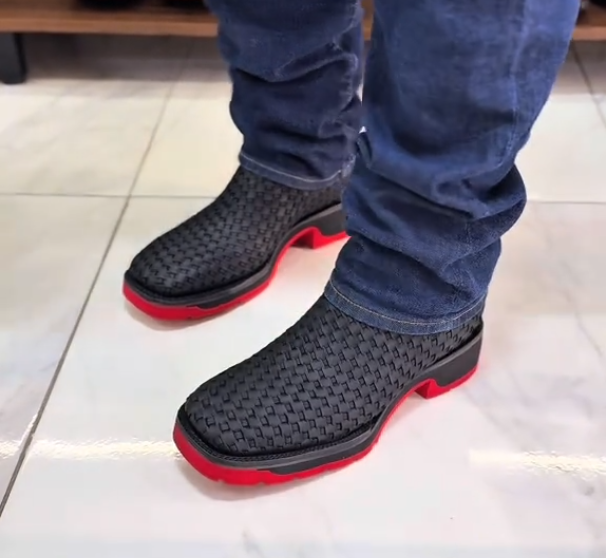 Red-soled ankle boots