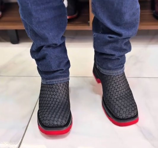 Red-soled ankle boots