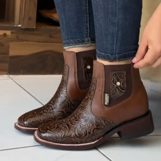 Western-style carved cowboy boots