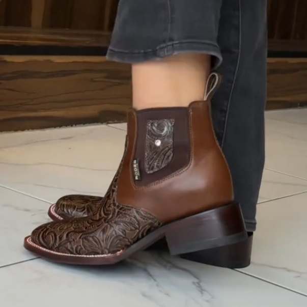 Western-style carved cowboy boots
